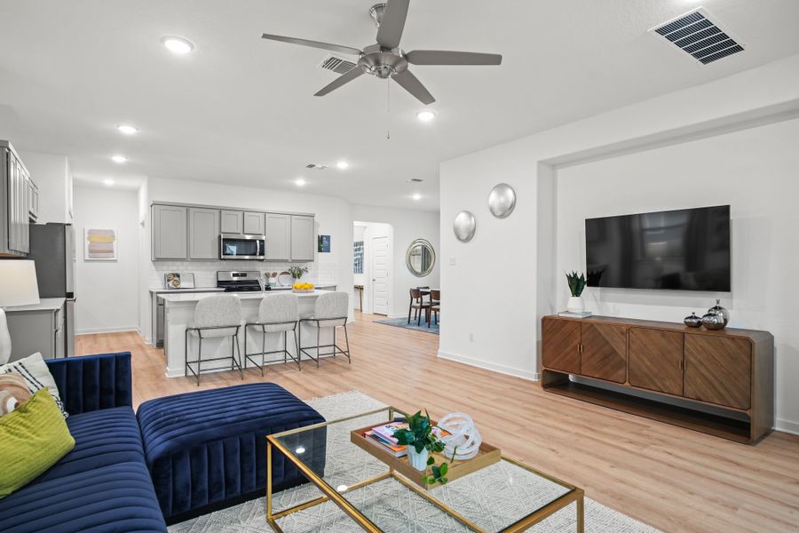 Living room in the Oak home plan by Trophy Signature Homes – REPRESENTATIVE PHOTO