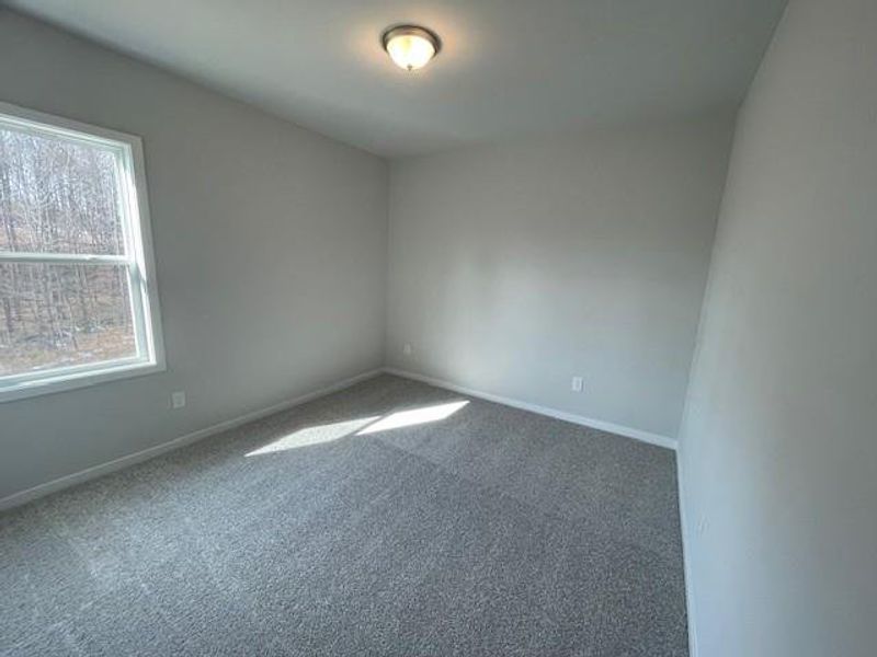 Spacious, unfurnished interior of a new home in Ponderosa Farms Estates, Gainesville (Image 30).