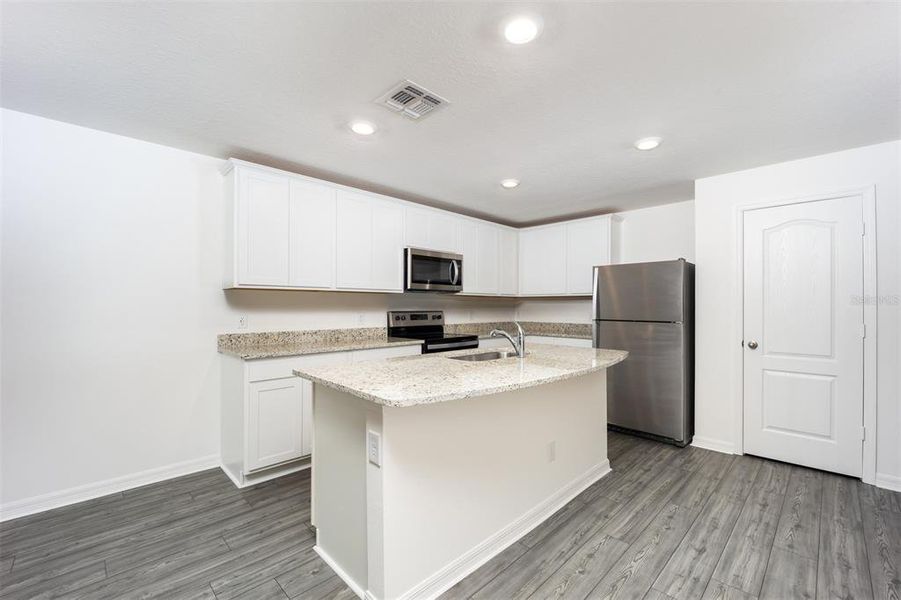 Furnished interior view inside a new home in Gum Lake Preserve, Lake Alfred (Image 7).