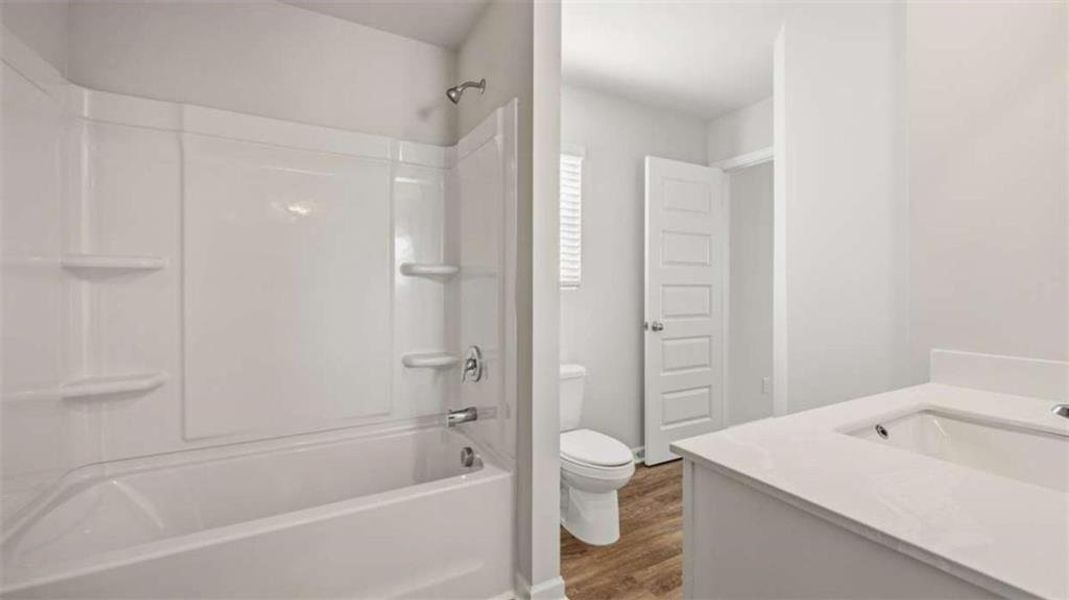 Furnished interior view inside a new home in Oakchase at Hampton, Hampton (Image 4).