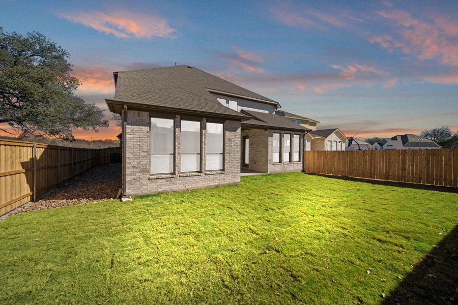 Rear of Home and Private Backyard