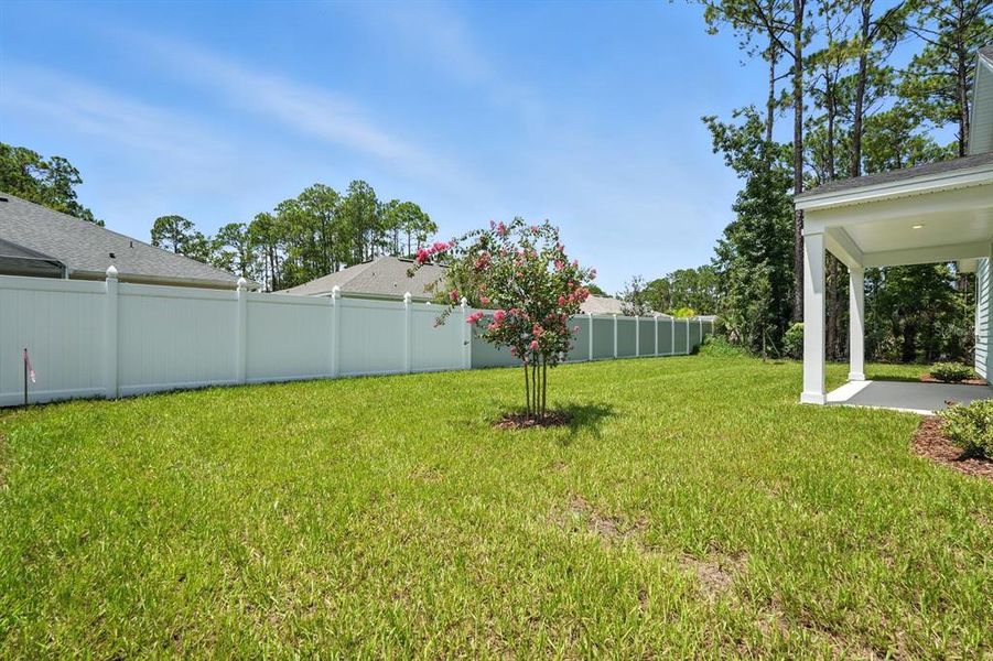 Front exterior of a new home in Palm Coast Homes, Palm Coast, FL, highlighting curb appeal (Image 22).