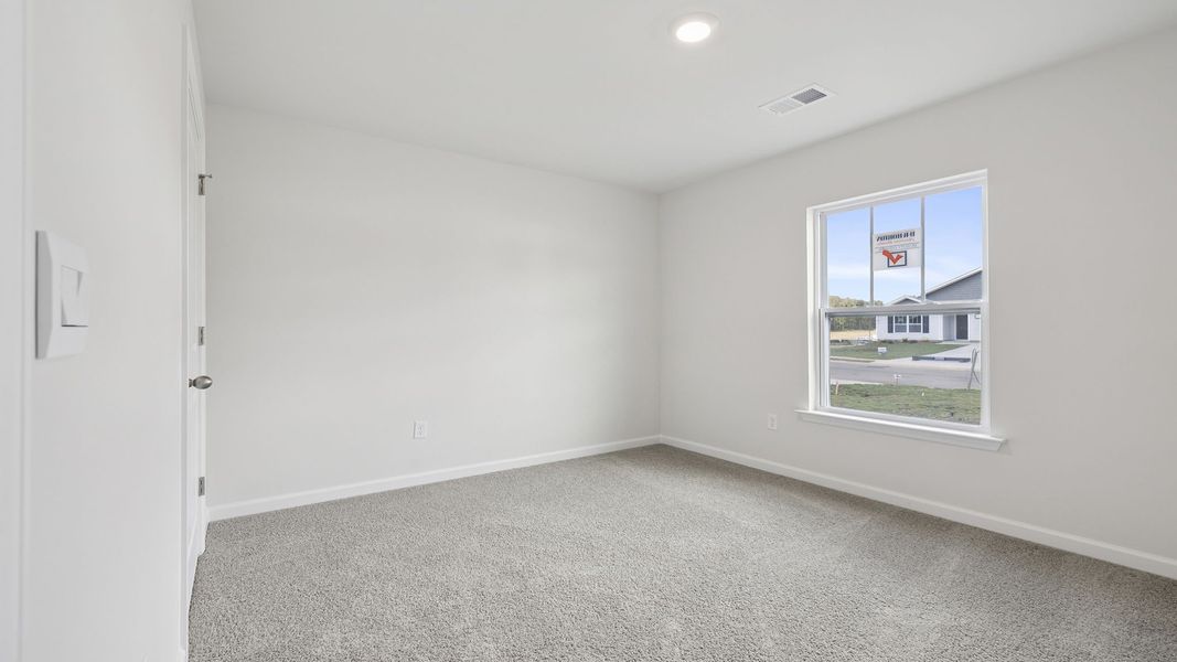 Spacious, unfurnished interior of a new home in Bentley Park, Greenwood (Image 14).