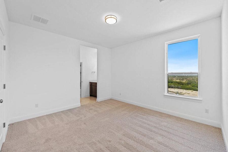 Spacious, unfurnished interior of a new home in Lariat - 80', Liberty Hill (Image 21). Spacious, unfurnished interior of a new home in Lariat - 80', Liberty Hill (Image 21).