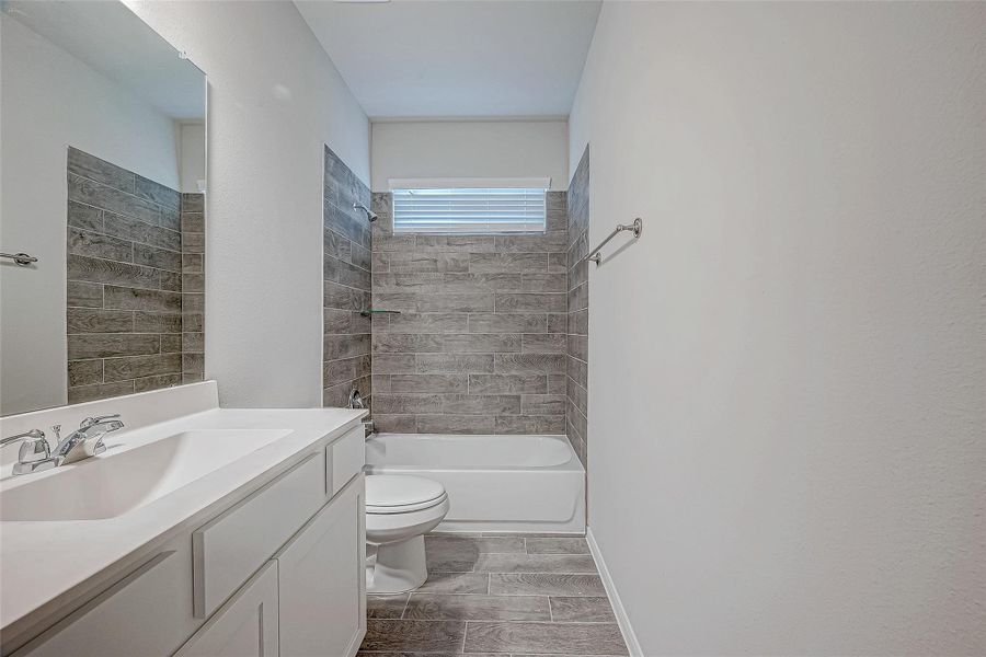 Furnished interior view inside a new home in Mill Creek Trails, Magnolia (Image 10).
