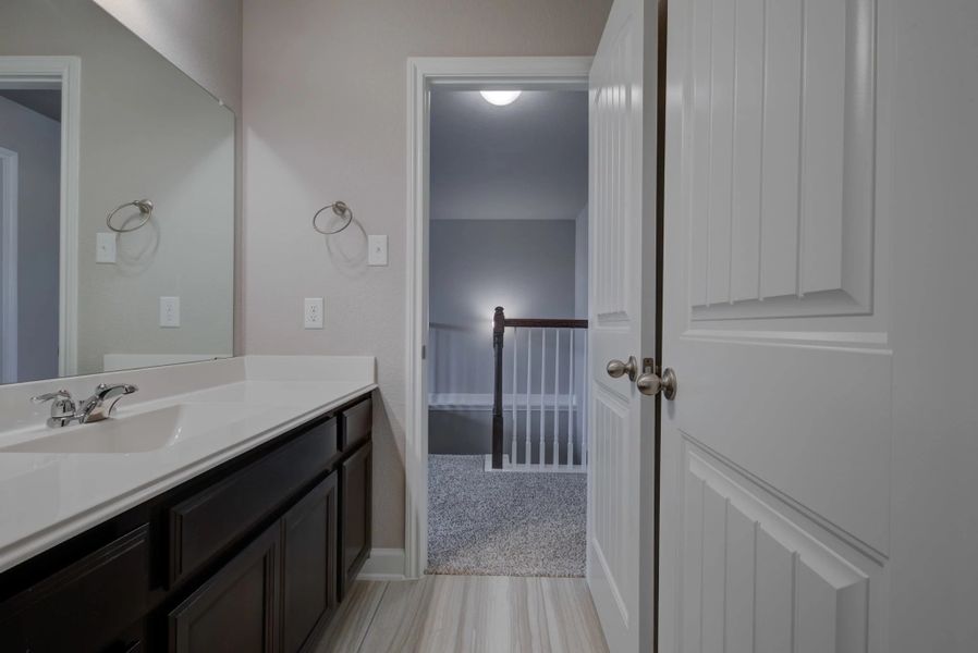 Representative furnished interior of a home built from the Cleburne by Ashton Woods in Mustang Oaks, San Antonio (Image 42).