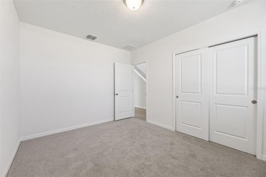 Spacious, unfurnished interior of a new home in Crosswinds - Signature Series, Haines City (Image 19).