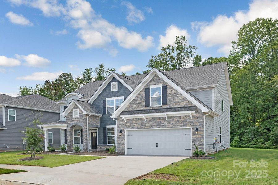 Front exterior of a new home in Sylvan Creek, Denver, NC, highlighting curb appeal (Image 25).