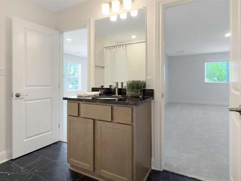 Another view of upstairs bathroom, both the game room and the private bedroom have access