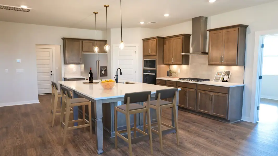 Representative furnished interior of a home built from the TISDALE by D.R. Horton in Harvest Point, Spring Hill (Image 6).