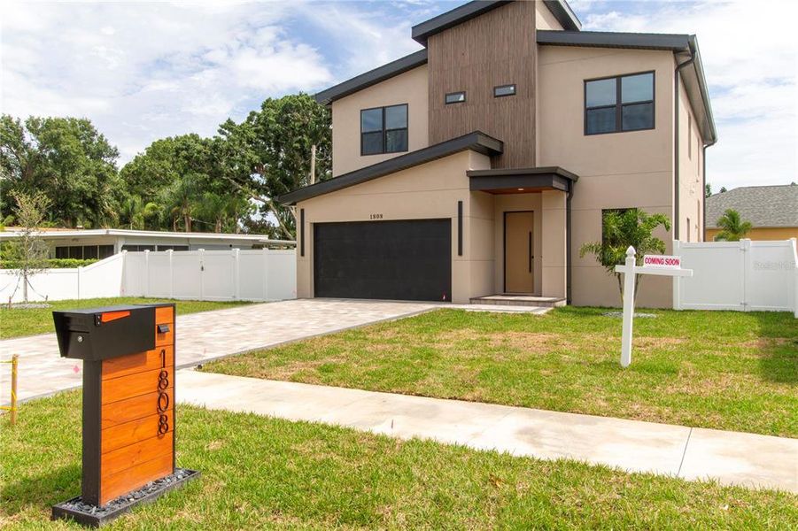 Front exterior of a new home in , Tampa, FL, highlighting curb appeal (Image 30).