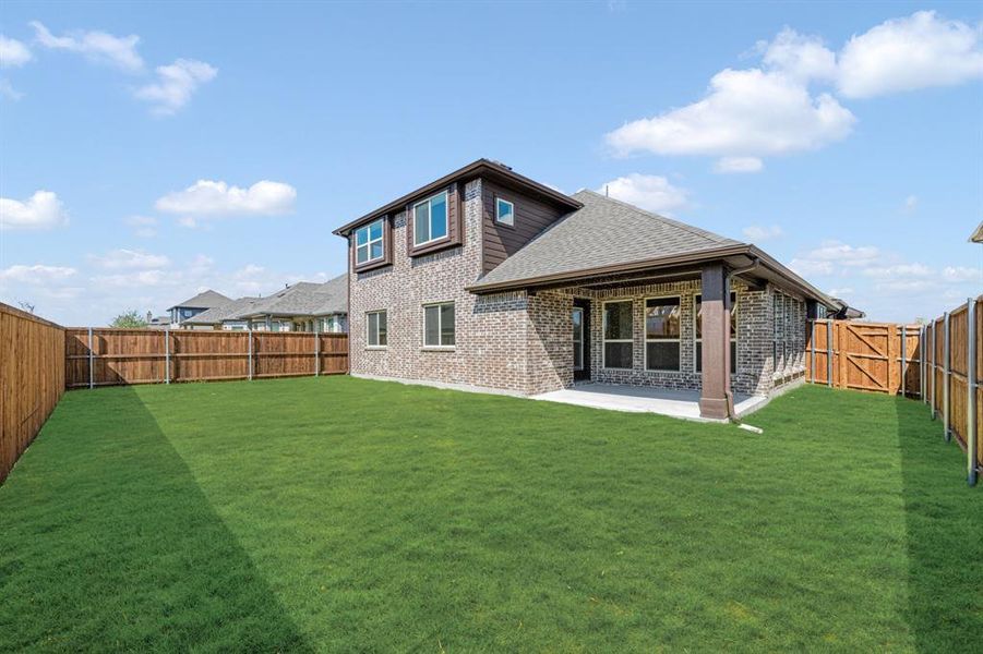 Exterior details and patio area of a home in Woodstone, Providence Village (Image 23). Exterior details and patio area of a home in Woodstone, Providence Village (Image 23).