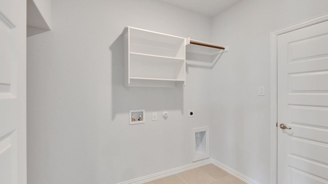 Furnished interior view inside a new home in Oaks at San Gabriel, Georgetown (Image 13).