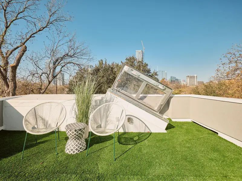 View of grassy yard with a patio