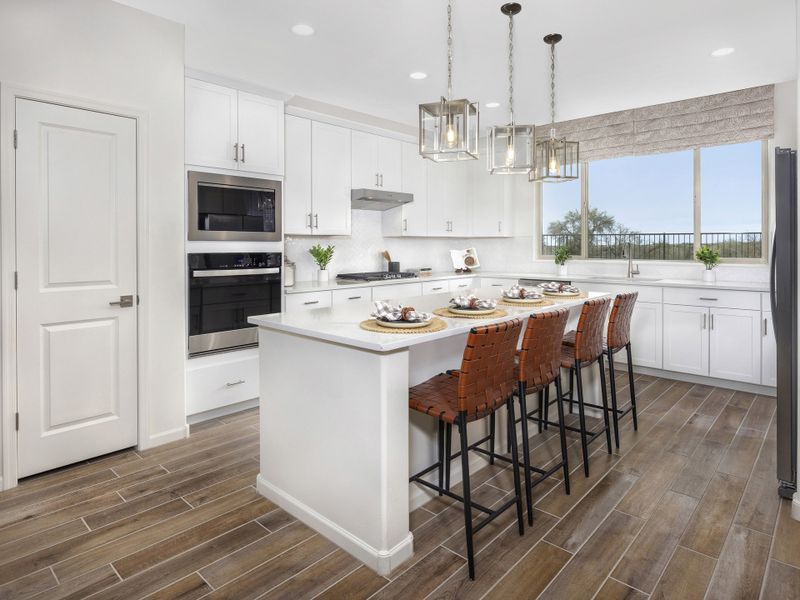 Enjoy plenty of seating and counterspace at the large kitchen island.
