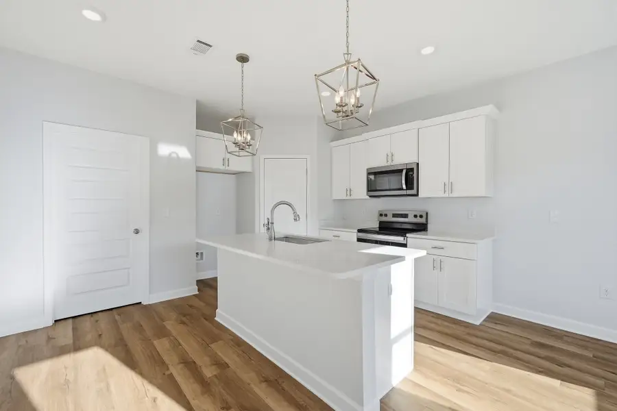 Furnished interior view inside a new home in McCarthy Estates, Defuniak Springs (Image 6).