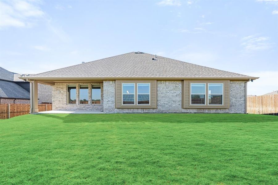 Exterior details and patio area of a home in The Grove, Midlothian (Image 1).