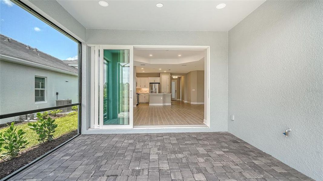 Exterior details and patio area of a home in Windward, Lakewood Ranch (Image 19).