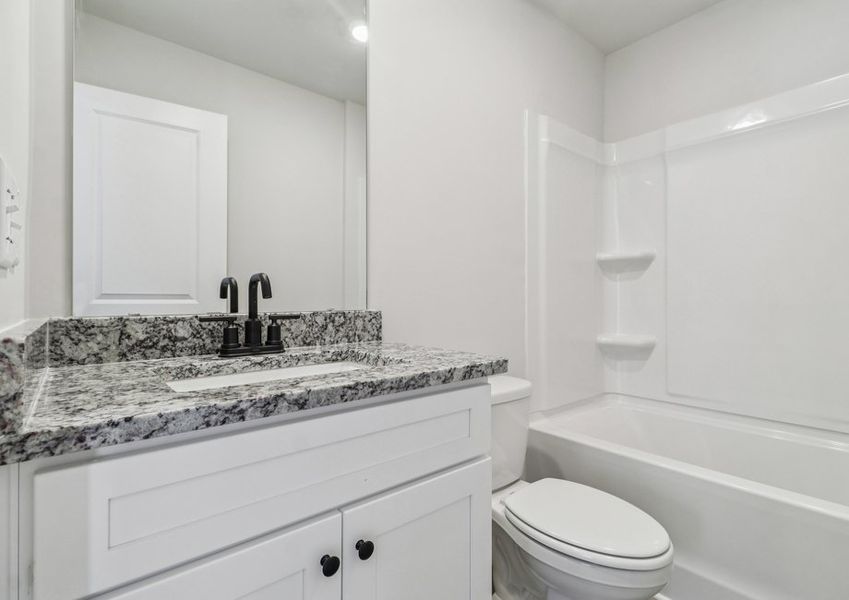 The bathrooms have granite countertops. The bathrooms have granite countertops.