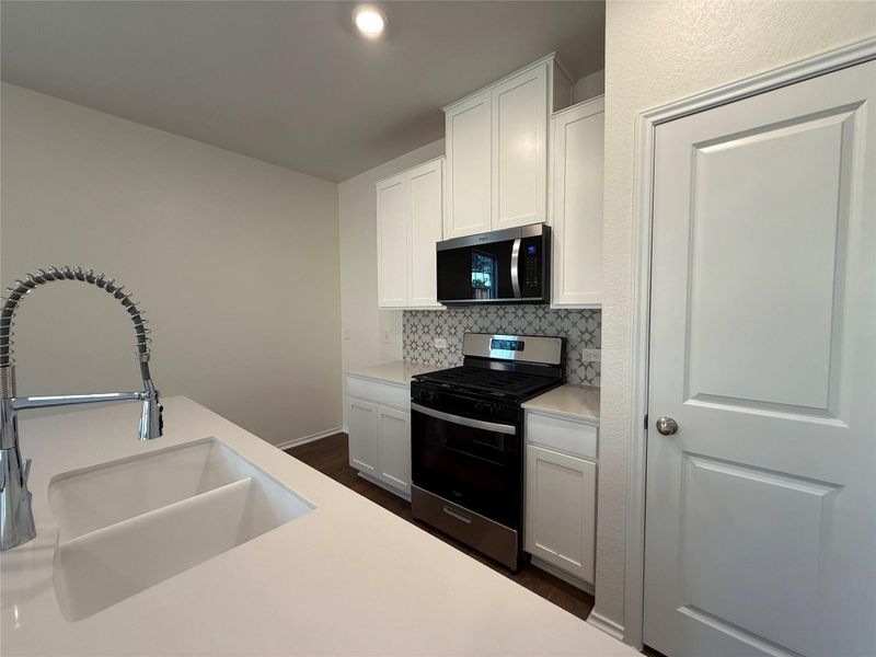 Furnished interior view inside a new home in River Bluff, Leander (Image 3).