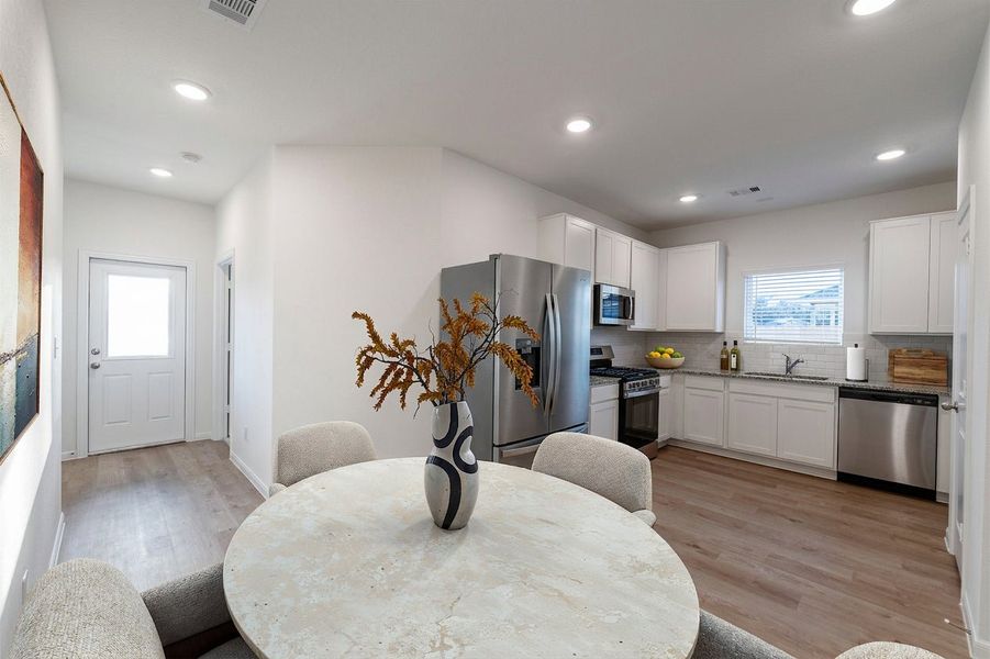 Representative furnished interior of a home built from the Pine by CastleRock Communities in Notting Hill, Converse (Image 6).