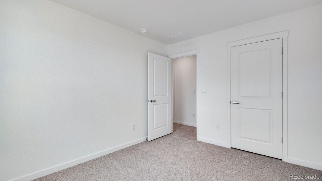 Spacious, unfurnished interior of a new home in Sky Ranch, Watkins (Image 37).