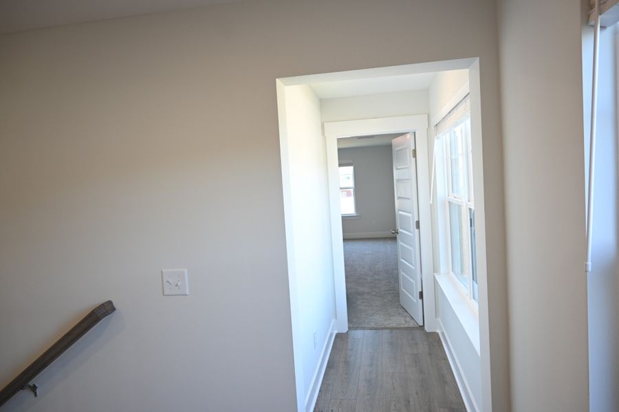 Spacious, unfurnished interior of a new home in Rookers Bend, Smyrna (Image 29).