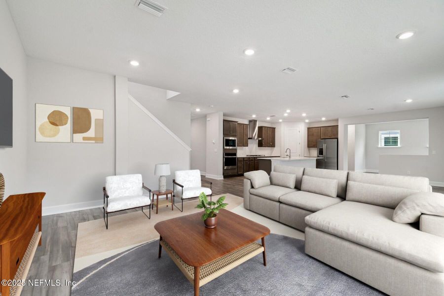 Furnished interior view inside a new home in Tributary 70', Yulee (Image 9).