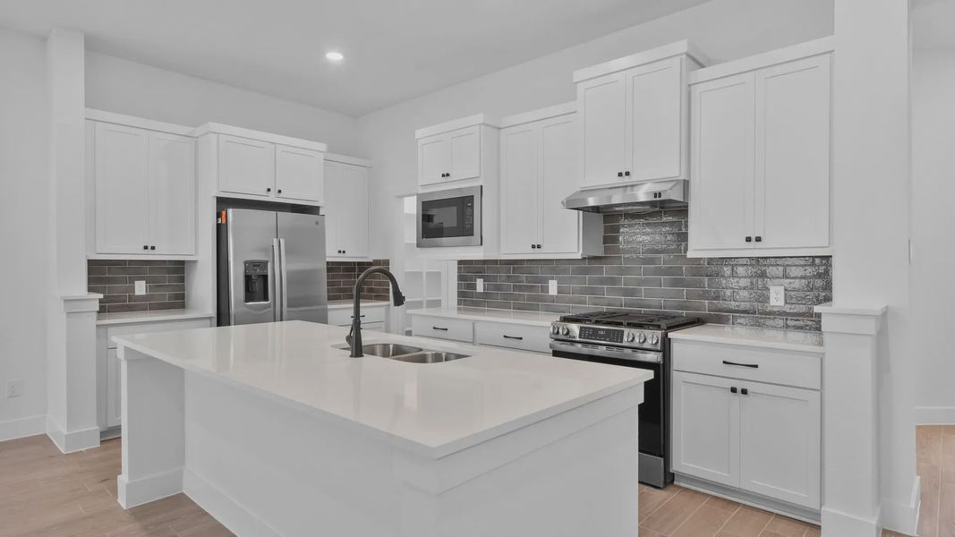 Furnished interior view inside a new home in Wildrye 45', Waller (Image 8).