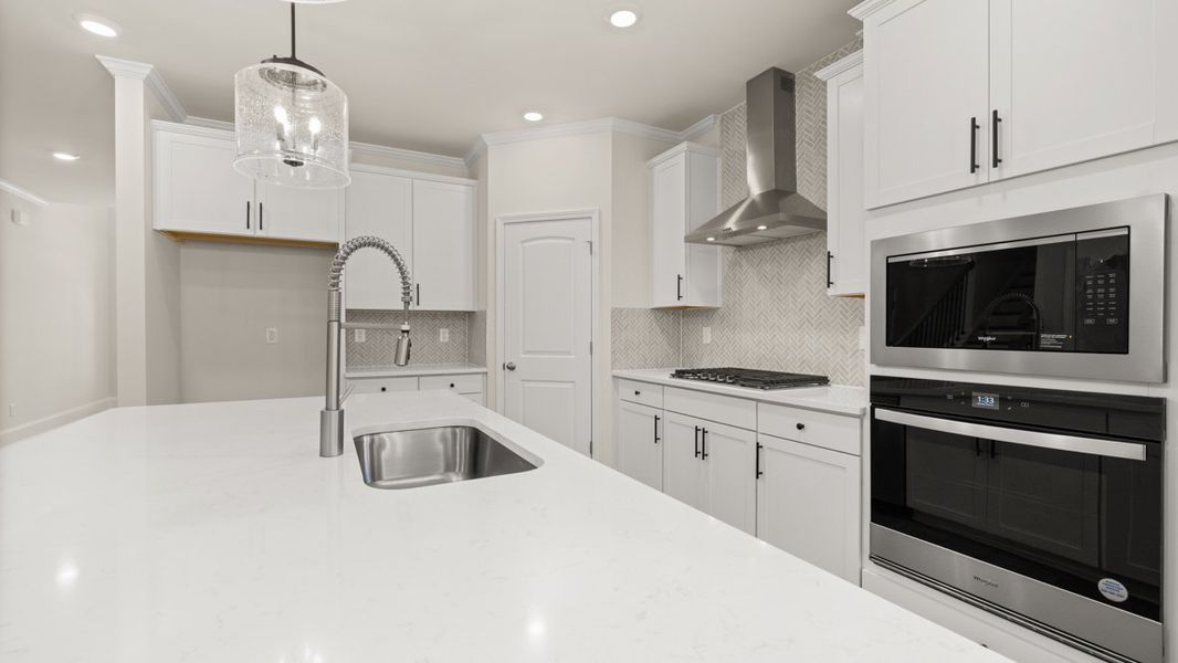 Representative furnished interior of a home built from the WINDSOR by D.R. Horton in Butner Estates, South Fulton (Image 10).