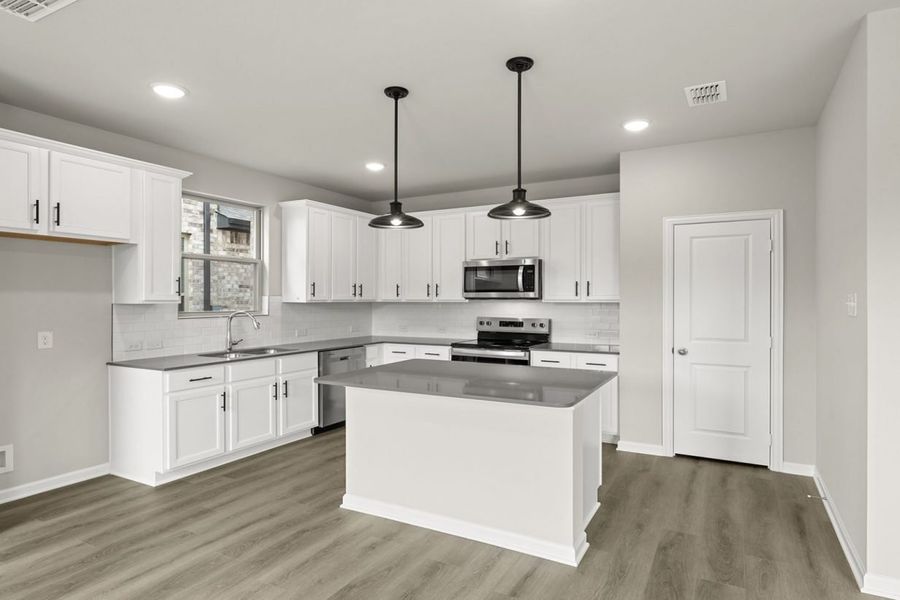 Representative furnished interior of a home built from the Montgomery Colony At Pinehurst by Brohn Homes in Colony at Pinehurst, Pinehurst (Image 5).