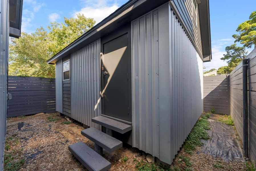 Exterior details and patio area of a home in , Houston (Image 18). Exterior details and patio area of a home in , Houston (Image 18).