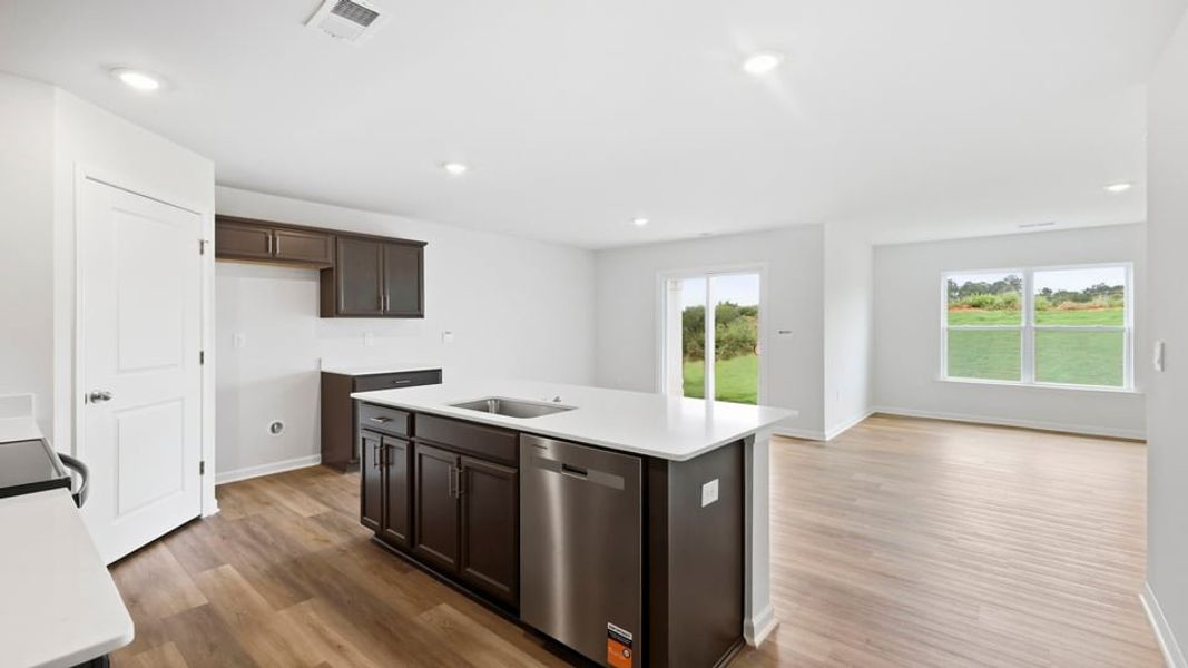 Furnished interior view inside a new home in Lakestone, Woodruff (Image 6).