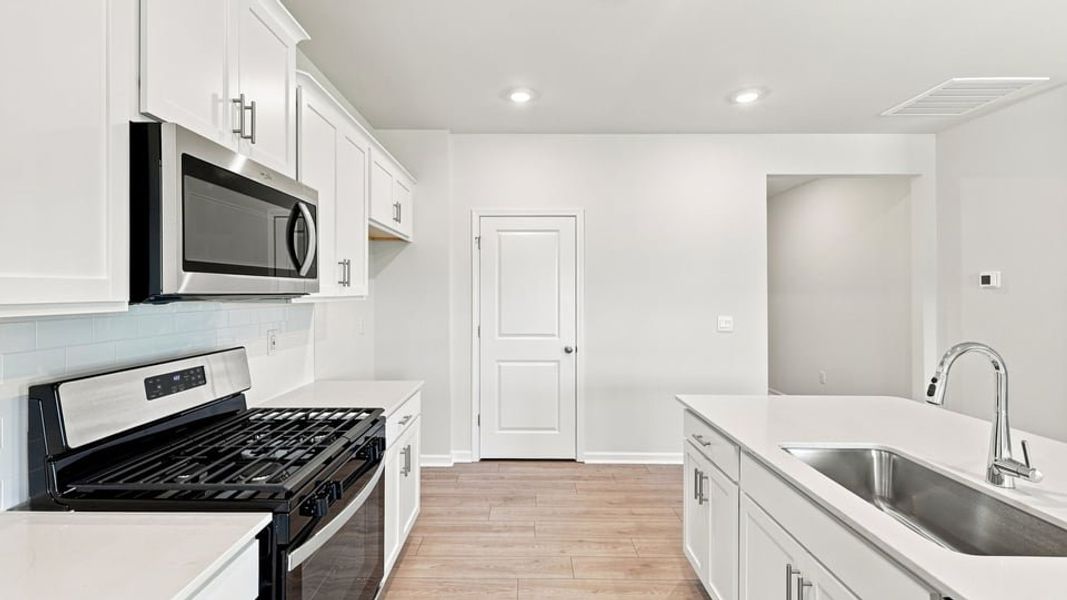 Furnished interior view inside a new home in Hunters Ridge, Woodruff (Image 11).