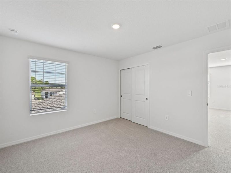 Spacious, unfurnished interior of a new home in Oakfield Trails - Premier Series, Parrish (Image 28).