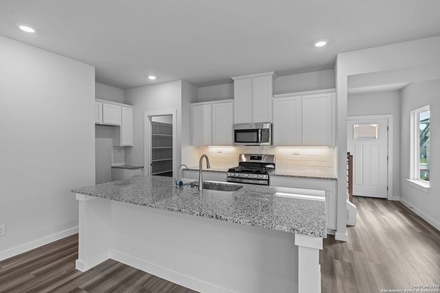 Furnished interior view inside a new home in The Meadows at Hunters Ranch, San Antonio (Image 8).