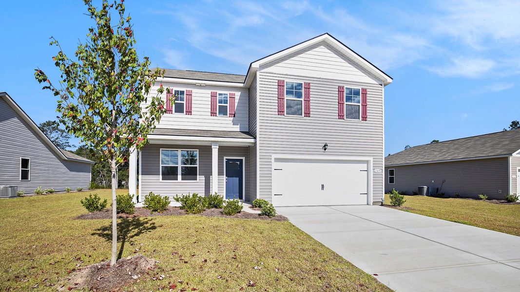 Front exterior of a new home in Stanbury Creek, Supply, NC, highlighting curb appeal (Image 2).