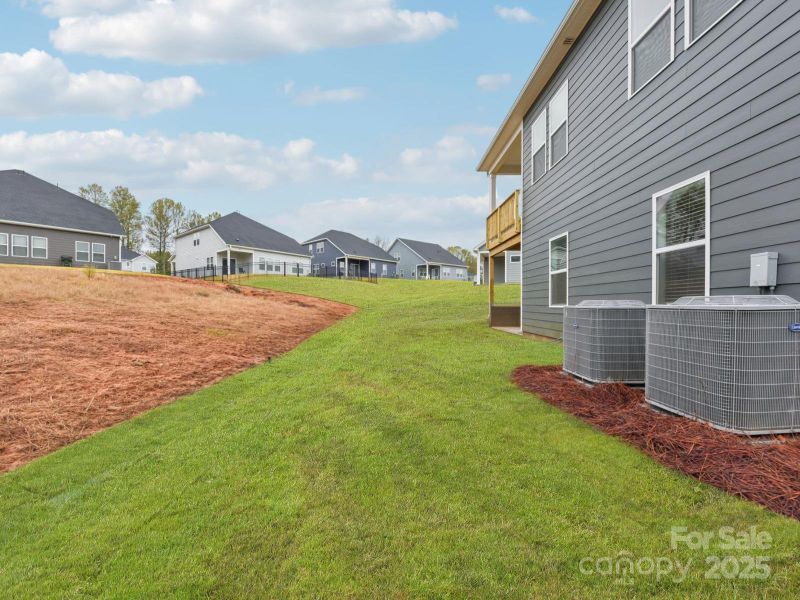 Exterior details and patio area of a home in Brighton Springs, York (Image 17).