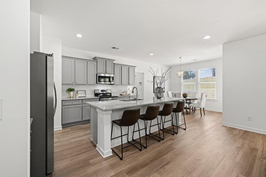 Furnished interior view inside a new home in Sutton's Landing, Statham (Image 13).