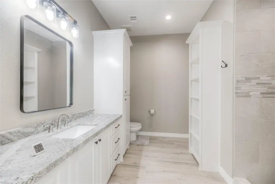 Bathroom 2/3 with plenty of counter and cabinet space with a stand up shower Bathroom 2/3 with plenty of counter and cabinet space with a stand up shower