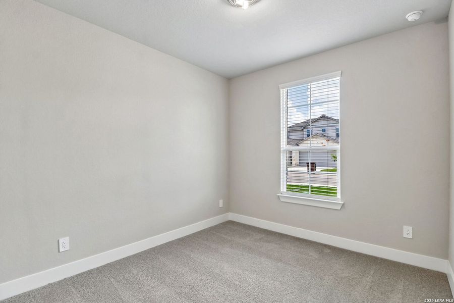 Spacious, unfurnished interior of a new home in Estancia Ranch - Premier Series, San Antonio (Image 32).