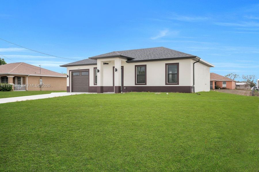 Exterior details and patio area of a home in , Lehigh Acres (Image 3).