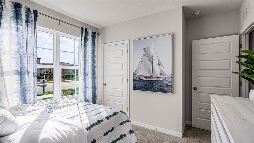 Furnished interior view inside a new home in Lake Deer Estates, Poinciana (Image 2). Furnished interior view inside a new home in Lake Deer Estates, Poinciana (Image 2).