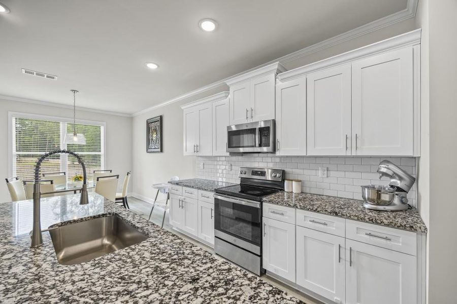 Furnished interior view inside a new home in , Winder (Image 62).