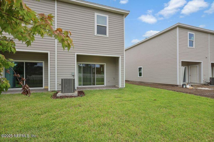 Front exterior of a new home in Sabal Terrace, Jacksonville, FL, highlighting curb appeal (Image 19).