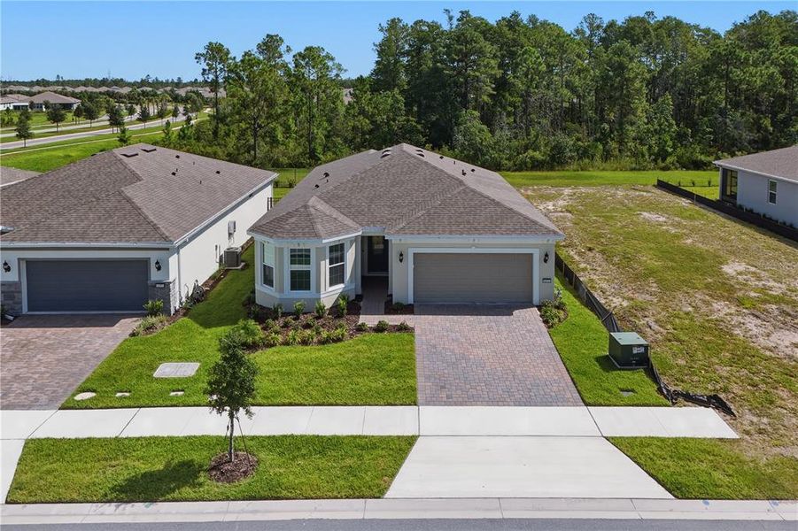 Front exterior of a new home in , St. Cloud, FL, highlighting curb appeal (Image 24).