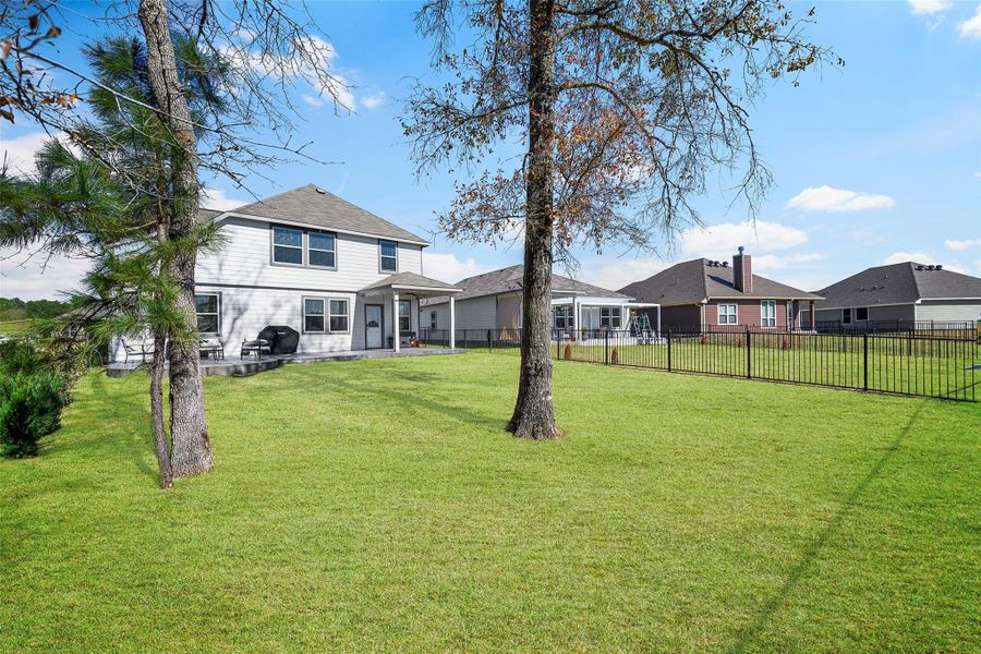 Exterior details and patio area of a home in Lakes at Crockett Martin, Conroe (Image 29). Exterior details and patio area of a home in Lakes at Crockett Martin, Conroe (Image 29).
