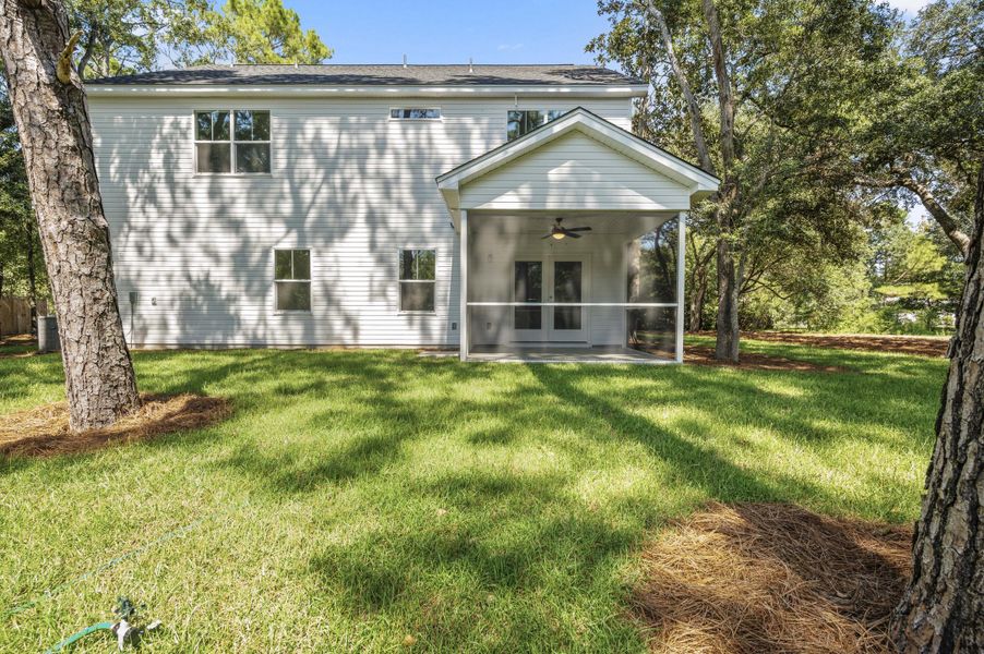 Exterior details and patio area of a home in , Johns Island (Image 16).