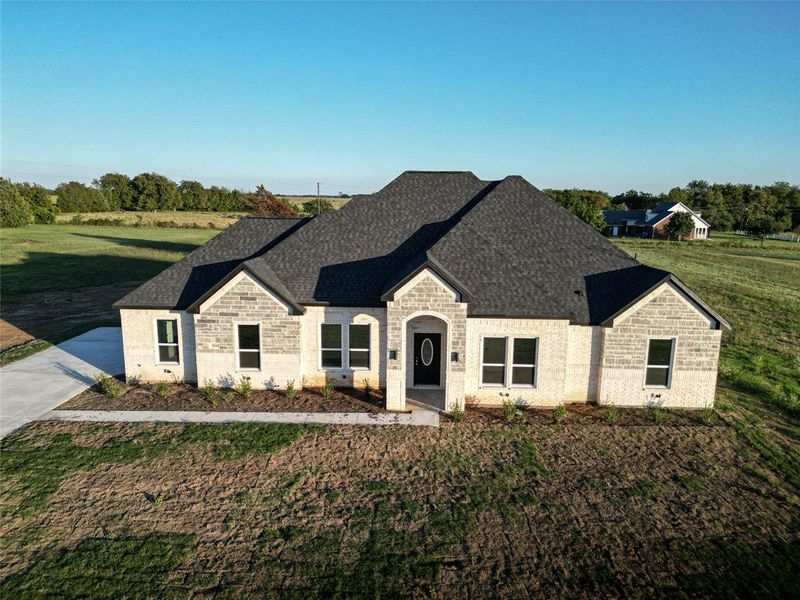 View of front of house with a front lawn