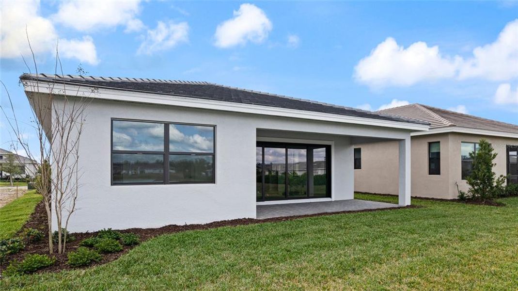 Exterior details and patio area of a home in Cresswind Lakewood Ranch, Lakewood Ranch (Image 23).